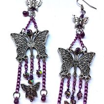 Long butterfly dangle earrings with purple chains