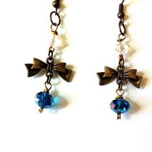 Cute antique gold bow earrings with blue crystals, bow earrings