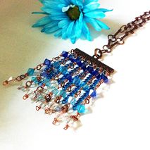 Ombre cascading blue swarovski crystal and chain tassle necklace