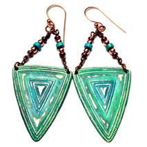 Distressed shields and beaded accent statement earrings