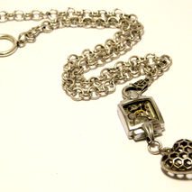 Handmade decorated silver colored steampunk necklace "Do not for