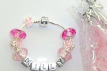 Childrens pink name bracelet with all charms choice of size