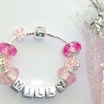 Childrens pink name bracelet with all charms choice of size