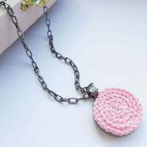 Charm necklace, pink medallion