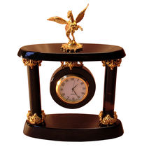 Obsidian quartz clock with brass elements and Pegasus on the top