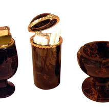 Smoking set made from obsidian includes ashtray, lighter and cig