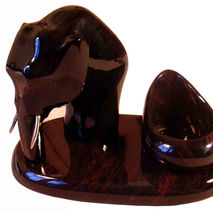 Obsidian pipe stand with elephant sculpture, this pipe holder is