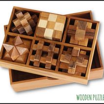 Set of 6 Puzzles in a wooden Box